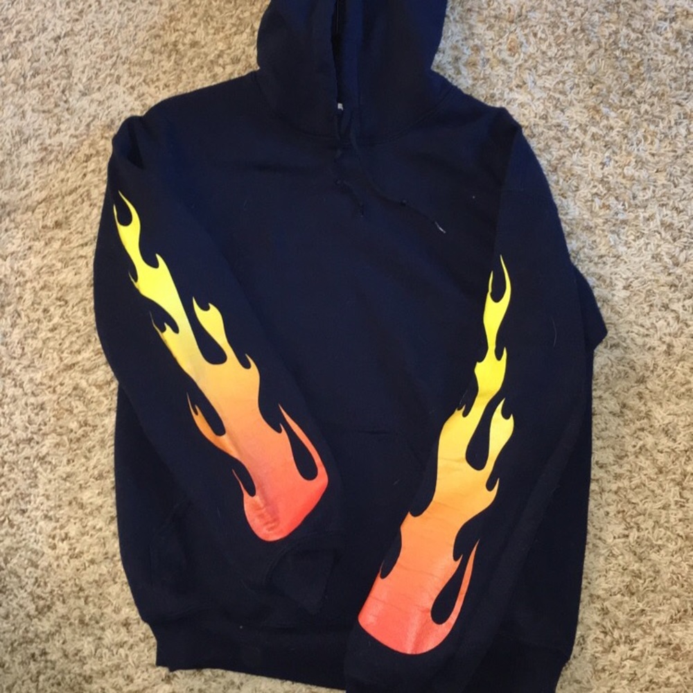 Navy blue hoodie with fire on the sleeve